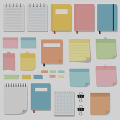 Colorful stationery collection with notebooks, sticky notes, and clips  