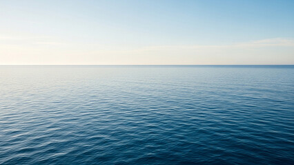 Obraz premium Calm Ocean Surface and Blue Horizon at Sunset