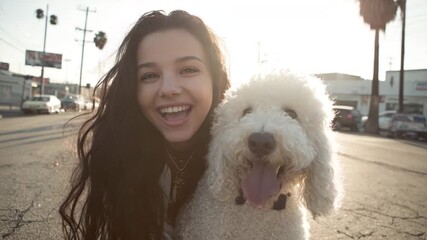 A loving close shot highlights the genuine connection between a woman and her loyal pet, capturing a moment of true friendship and warmth.