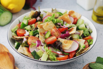 A bowl with Fattoush - Traditional Levantine salad