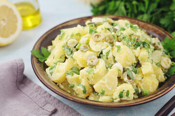 A bowl with Greek potato salads	