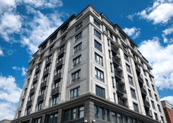 Obraz premium A building with a gray stone facade, tall and a square shape, with large windows on the first floor and smaller window sizes above it Generative AI