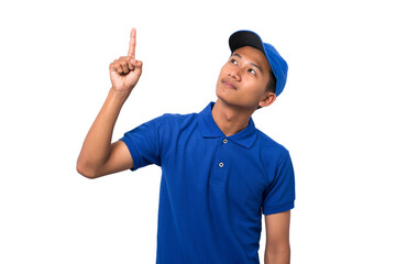 Smiling young asian delivery man wearing blue uniform pointing present a product