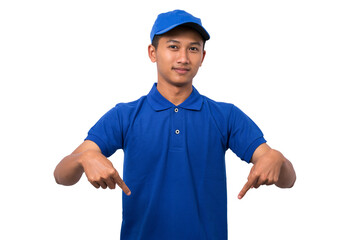 Smiling young asian delivery man wearing blue uniform pointing present a product