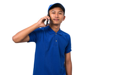 Young asian delivery man wearing blue uniform make a phone call. contact us concept