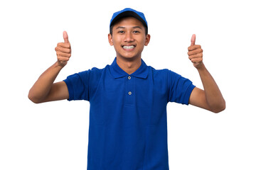 Young asian delivery man wearing blue uniform give a thumbs up like gesture on white background