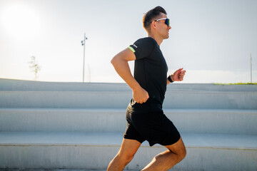 Runner enjoys a bright morning workout on open steps in the park