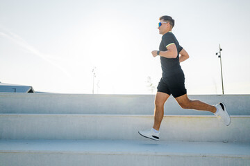 Runner enjoying an energetic morning workout under the bright sunshine