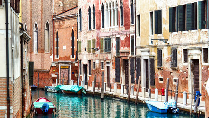a canal and the characteristic houses of Venice