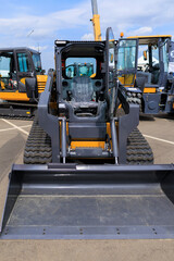 Agricultural machinery and parts of mechanisms on a sunny day. Texture, background for design. 