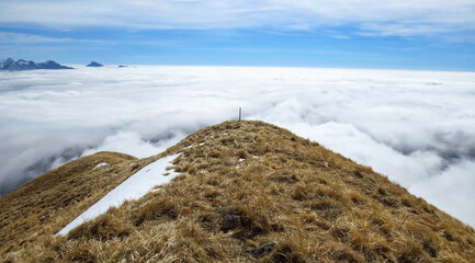 a magnificent sea of ​​clouds under the crest of the Parma Apennines