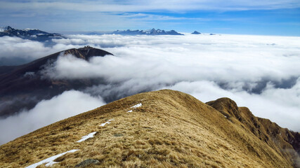 a magnificent sea of ​​clouds under the crest of the Parma Apennines