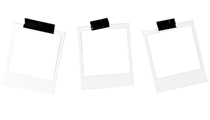 Set of photo frames mockup hanging by black adhesive tapes with shadows. Photo polaroid template, White border on a transparent background
