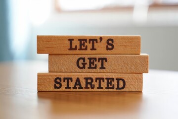 Wooden blocks with words 'Let's get started.