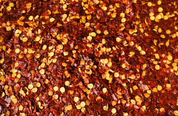 Red chili pepper texture. Spicy seasoning 
