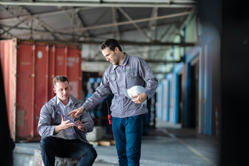 Modern transport team planning container delivery with tablet support. Ideal for SaaS logistics...