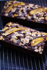 Vegan banana cake, Banana cake with almonds and chocolate chips on top, Banana bread or cake for breakfast and celebration cakes.