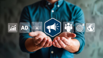 A man holds out his hands, displaying a digital interface with icons representing marketing, advertising, and business growth strategies
