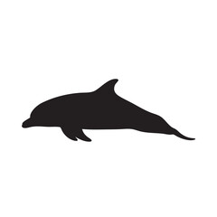 Obraz premium Silhouette of a graceful dolphin gliding through the ocean waters with ease