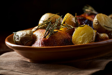 Crispy Baked Chicken Legs with potatoes.