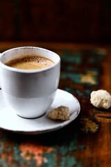Cup of coffee on wooden background. Soft focus. Copy space	