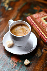 Cup of coffee on wooden background. Soft focus. Copy space	
