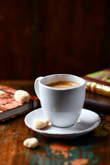 Cup of coffee on wooden background. Soft focus. Copy space	