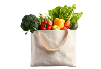 Eco bag with healthy food, an eco friendly concept. Fresh vegetables inside a beige cotton grocery eco-friendly fabric bag, full of fruits, vegetables, juice, or a smoothie.