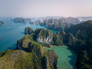 Scenic aerial view of Halong bay's limestone islands and emerald waters in Vietnam