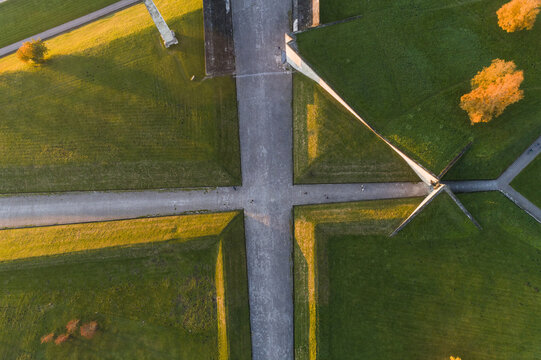 Aerial view of the striking geometric patterns of green grass and concrete pathways create a compelling design, Tallinn, Harju County, Estonia.