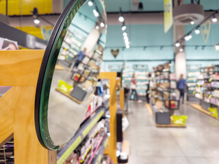 buying cosmetics, cream, shampoo in a perfume shop