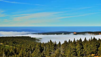Low Clouds Cover Valley Below Hilltop Mountain Ridges