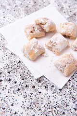 Stollen Bites on bright background. Soft focus. Close up. Copy space.	