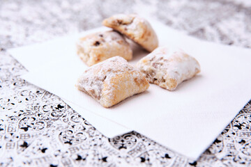 Stollen Bites on bright background. Soft focus. Close up. Copy space.	