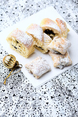 Stollen Bites on bright background. Soft focus. Close up. Copy space.	