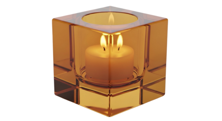 Candle burns brightly inside amber glass cube on dark background, creating soft glow
