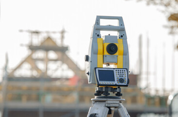 Close-up of Land surveyors equipment theodolite or total positioning station set by engineer on...