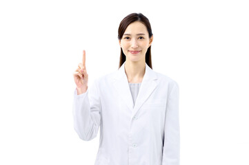 指差しポーズで説明する白衣の女性　医師　ドクター