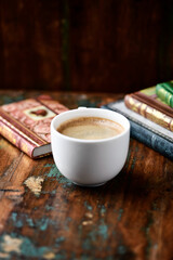 Cup of coffee on wooden background. Soft focus. Copy space	
