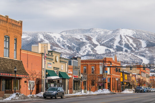 Steamboat Springs, CO, US-February 1, 2020: Charming western main street in town with mountains and ski slopes in background.