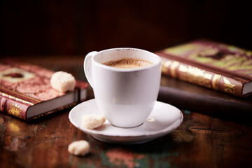 Cup of coffee on wooden background. Soft focus. Copy space	