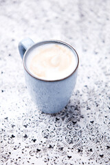 Cappuccino on bright background. Soft focus. Copy space	