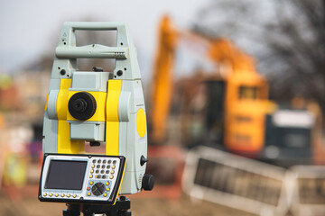 Close-up of Land surveyors equipment theodolite or total positioning station set on tripod on...