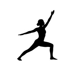 Silhouette of a woman in warrior one yoga pose with arms extended upward