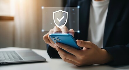 Mobile Security: Person Using Smartphone with Security Shield Icon Overlay for Data Protection & Cyber Safety Concept