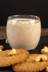 cookies and yogurt , close up, a breakfast of oatmeal cookies and a glass of yogurt