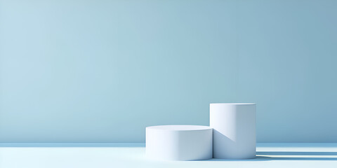 Two white cylindrical pedestals on a light blue background