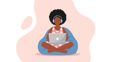 Woman using laptop and headphones, perfect for websites, blogs, and social media posts about remote work, technology, or relaxation.