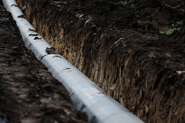 Installation of a huge industrial gas pipe line on a field