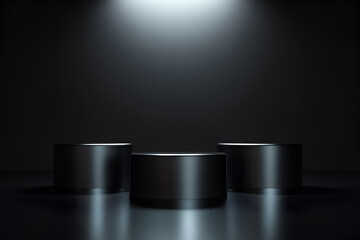 Three dark cylindrical pedestals on reflective surface